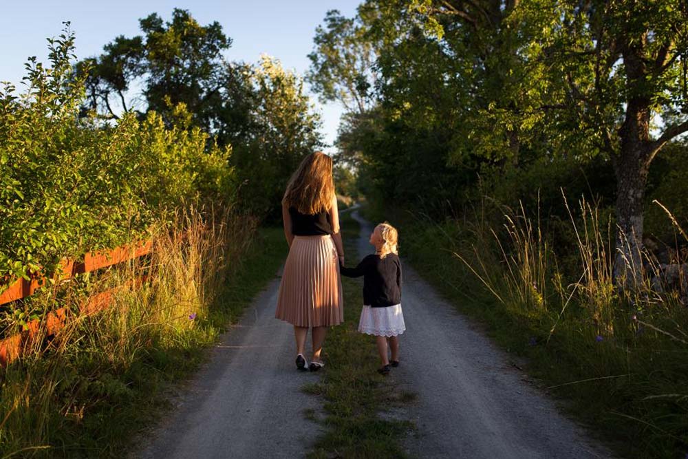 mother and daughter walking